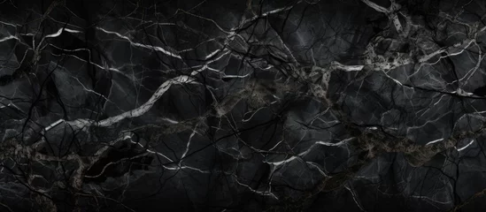 Foto op Aluminium Oud gebouw The close-up view captures the detailed textures of a black and white stone wall, showcasing the rough surfaces and contrasting colors. The stones are tightly fitted together, creating a sturdy and