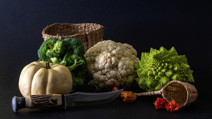 still life photo with photo of cauliflower, different colors and varieties of cauliflower