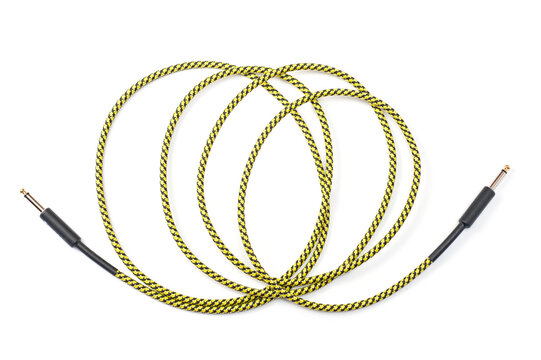Jack cord for guitar and connection of various musical devices, pedals, amplifier and so on. - Powered by Adobe