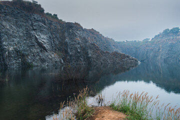 reflection in the water of a lake within the mountains.