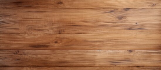 Obraz premium A detailed view of a wooden floor against a plain white backdrop. The focus is on the texture and color variations of the wood, highlighting its natural beauty and warmth.