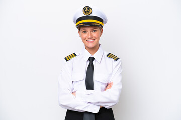 Airplane caucasian pilot woman isolated on white background keeping the arms crossed in frontal position