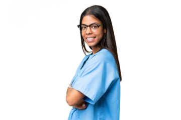 Young African american nurse woman over isolated background with arms crossed and looking forward
