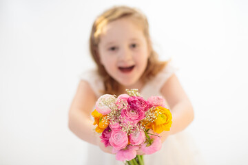 Little girl with flower bouquet