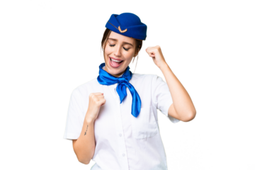Airplane stewardess over isolated chroma key background celebrating a victory