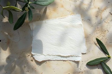 Summer wedding stationery mock up scene. Blank cotton paper greeting cards, invitations with olive leaves. Elegant marble background in sunlight, shadows overlay. Flat lay, top view. generative ai.