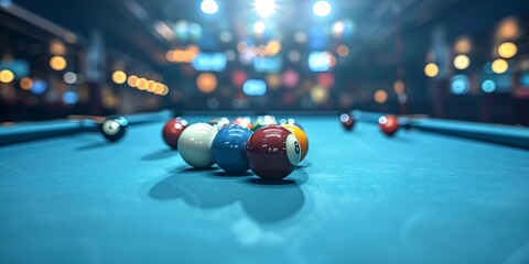 A game of pool with balls and cue on the table. - obrazy, fototapety, plakaty
