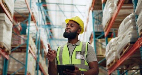 Inspection, walking in warehouse and black man with tablet for manufacturing, inventory and stock. Shipping, distribution and person on digital tech for logistics, maintenance and online in factory