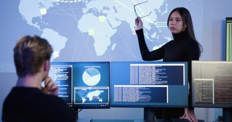 Focused professional cyber security team working to prevent security threats, find vulnerability and solve incidents