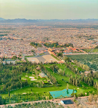 Aerial picture of Marrakech and the Medina at sunset taken from the air