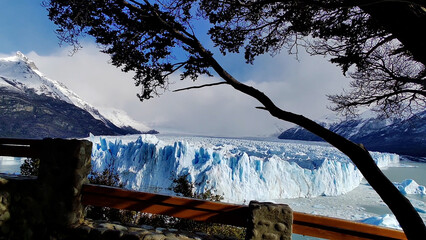 Perito Moreno Catwalks At El Calafate In Patagonia Argentina. Nature Landscape. Glacial Scenery. Patagonia Argentina. Iceberg Background. Perito Moreno Catwalks At El Calafate In Patagonia Argentina. - obrazy, fototapety, plakaty