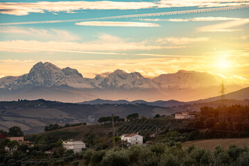 Sunset in countryside with mountains