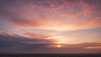 Stunning cloudy sunset sky with a heart shaped cloud