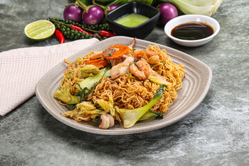 Asian cuisine - Fried noodles with seafood