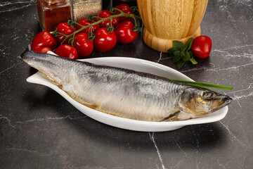 Whole raw salted herring fish
