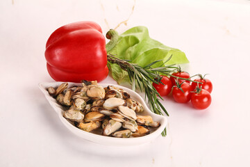 Marinated mussels in the bowl
