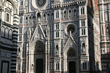 Facade of Florence Cathedral (Italian: Duomo di Firenze), built in Gothic style with white Carrara marble, green and pink marbles from Prato and Maremma, decorated with geometric patterns