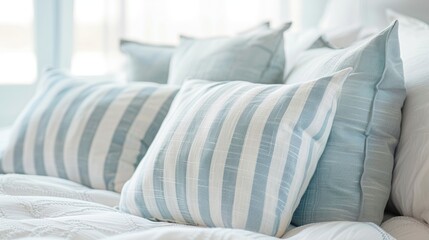 Fototapeta na wymiar White and light blue striped pillows with pattern