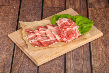 Sliced pork bacon in the bowl