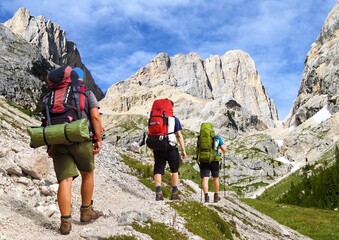 hikers and mount marmolada, Alps Dolomites mountains - 754821962