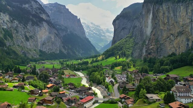Aerial view of Lauterbrunnen valley in Switzerland. Gorgeous mountains with glaciers, waterfalls and valley - nature of Swiss Alps. Swiss alpine village Lauterbrunnen 