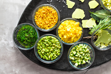 Glass bowls with vegetables and fruits