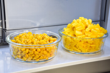Mango and corn in the refrigerator