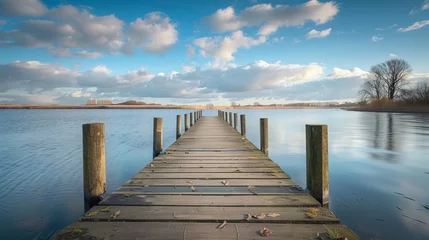 Foto op Plexiglas wooden pier on big lake in Groningen © Emil