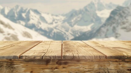 Picturesque view of snow-covered mountains through a rustic wooden table top.