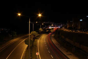 Fototapeta na wymiar Headlight line of vehicles with long exposure at night 