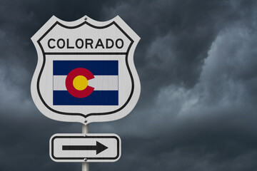 Colorado map and state flag on a USA highway road sign