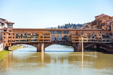Fotobehang The Ponte Vecchio is a medieval on the Arno River, Florence, Italy © EnginKorkmaz