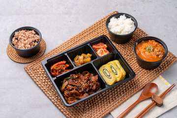 Korean food, pork, stir-fried pork, soybean paste, grilled, webfoot octopus, lunch box, egg roll, side dish, rice, kimchi,