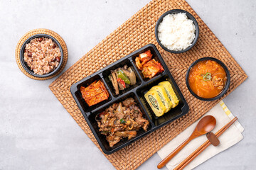Korean food, pork, stir-fried pork, soybean paste, grilled, webfoot octopus, lunch box, egg roll, side dish, rice, kimchi,