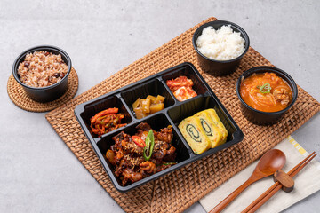 Korean food, pork, stir-fried pork, soybean paste, grilled, webfoot octopus, lunch box, egg roll, side dish, rice, kimchi,