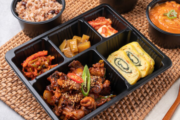 Korean food, pork, stir-fried pork, soybean paste, grilled, webfoot octopus, lunch box, egg roll, side dish, rice, kimchi,