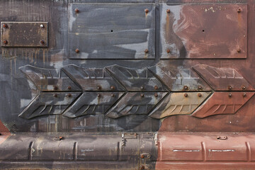 abstract khaki background metal tank armour close-up