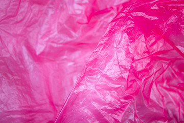 Plastic bag crumpled, background. Polyethylene film, packaging, waste recycling.