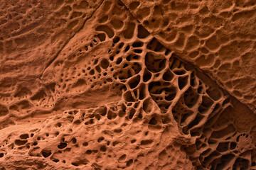 Red sandstones formations in the Areny mountain in Mont-Roig, Tarragona, Catalonia, Spain. Textures natural background.