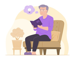 Obraz premium Elderly Man Sitting on Sofa and Reading a Book in Living Room