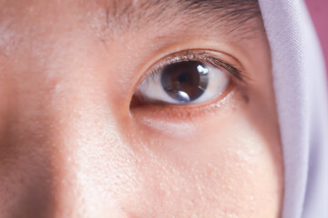 Close up photo of Asian people's eyes, namely Indonesia, with black eyeballs