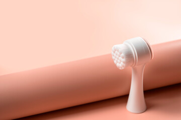 Brush for washing and cleansing the face. Hygienic device. Female beauty.