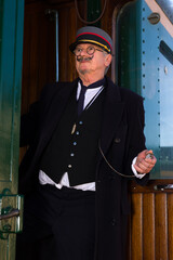 Railway conductor at departure