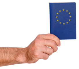 Isolated male hand holds blue European passport.