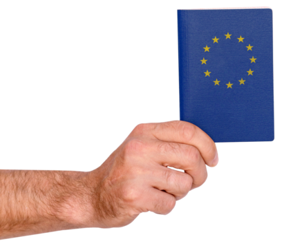 Isolated male hand holds blue European passport.