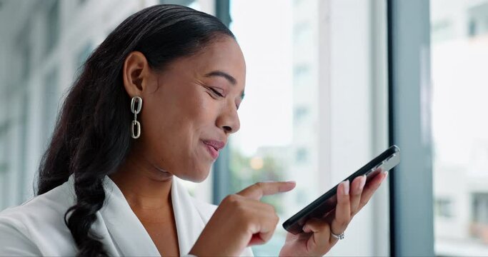 Business woman, speaker phone call and smile at window in modern office for communication, contact or networking. Person, smartphone and voice notes with recording, conversation or reminder on app