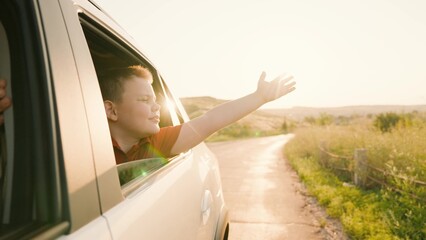 summer vacation mood, children vacation car trip, happy family enjoying traveling together, looking...