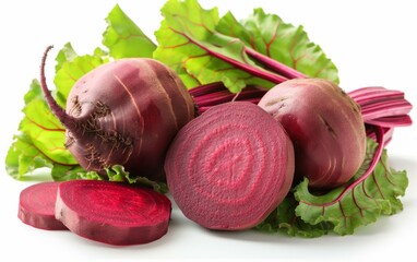 A close up of a red beet with a green leaf. The beet is cut in half and the other half is still whole