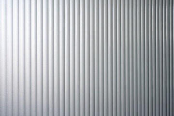 Abstract ribbed glass background.

