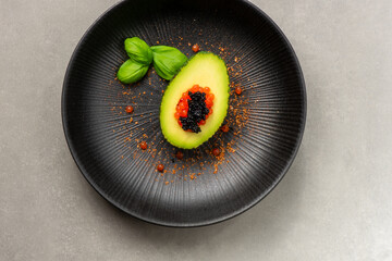 caviar in an avocado slice